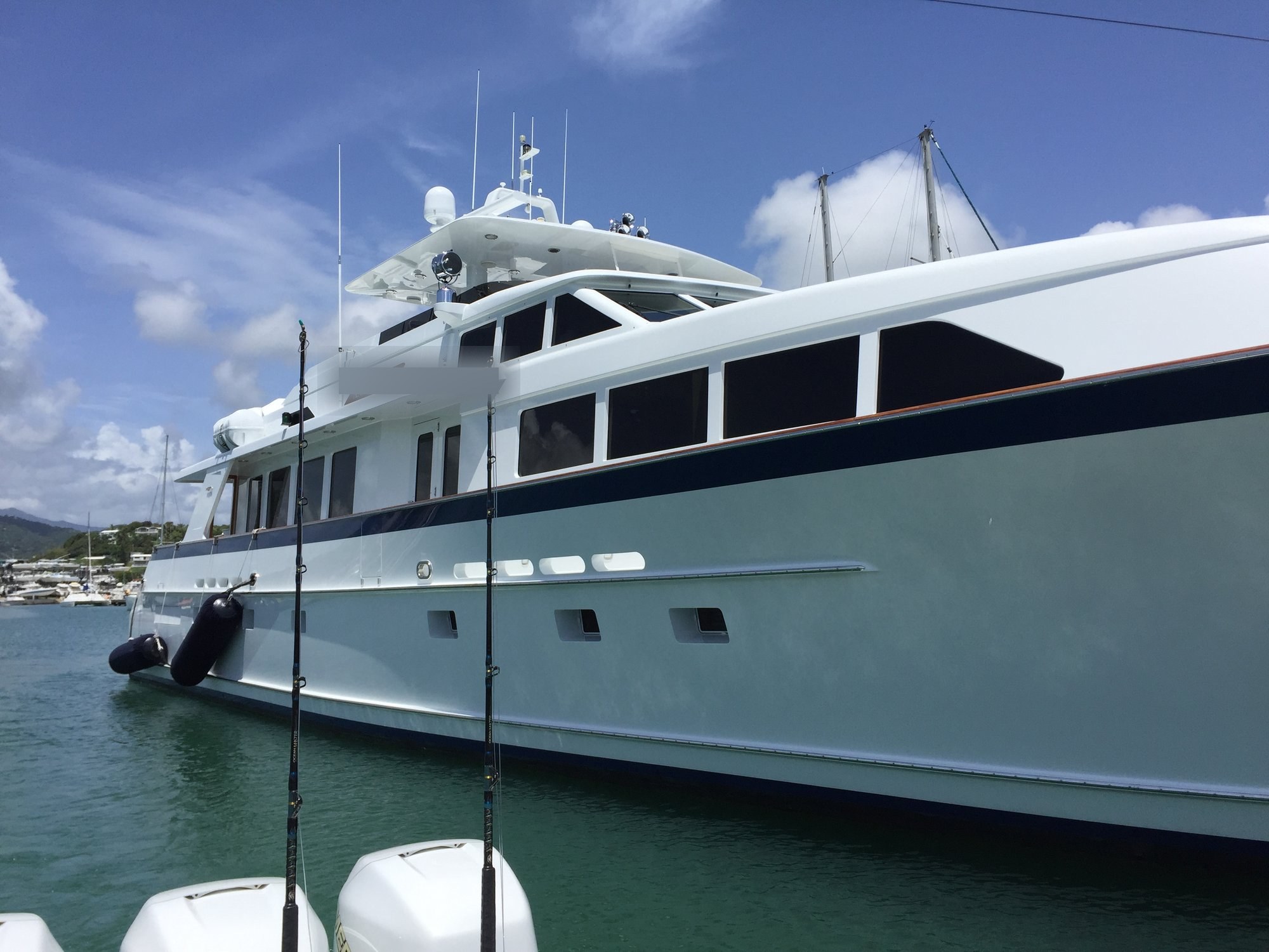 Motor yacht broadside on calm water